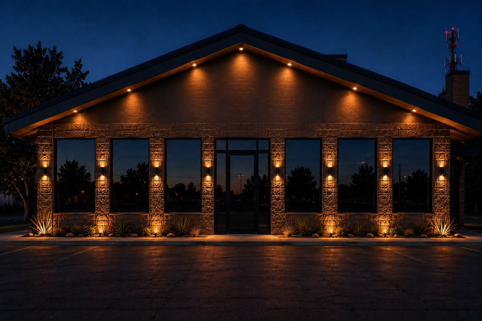 Timpson Event Center exterior lit up at night